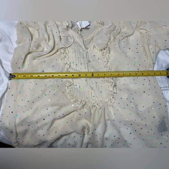 Chic Cream Ruffled Blouse with Subtle Sparkle - Picture 2 of 5